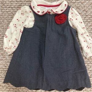Dress with red flowers and scalloped bottom